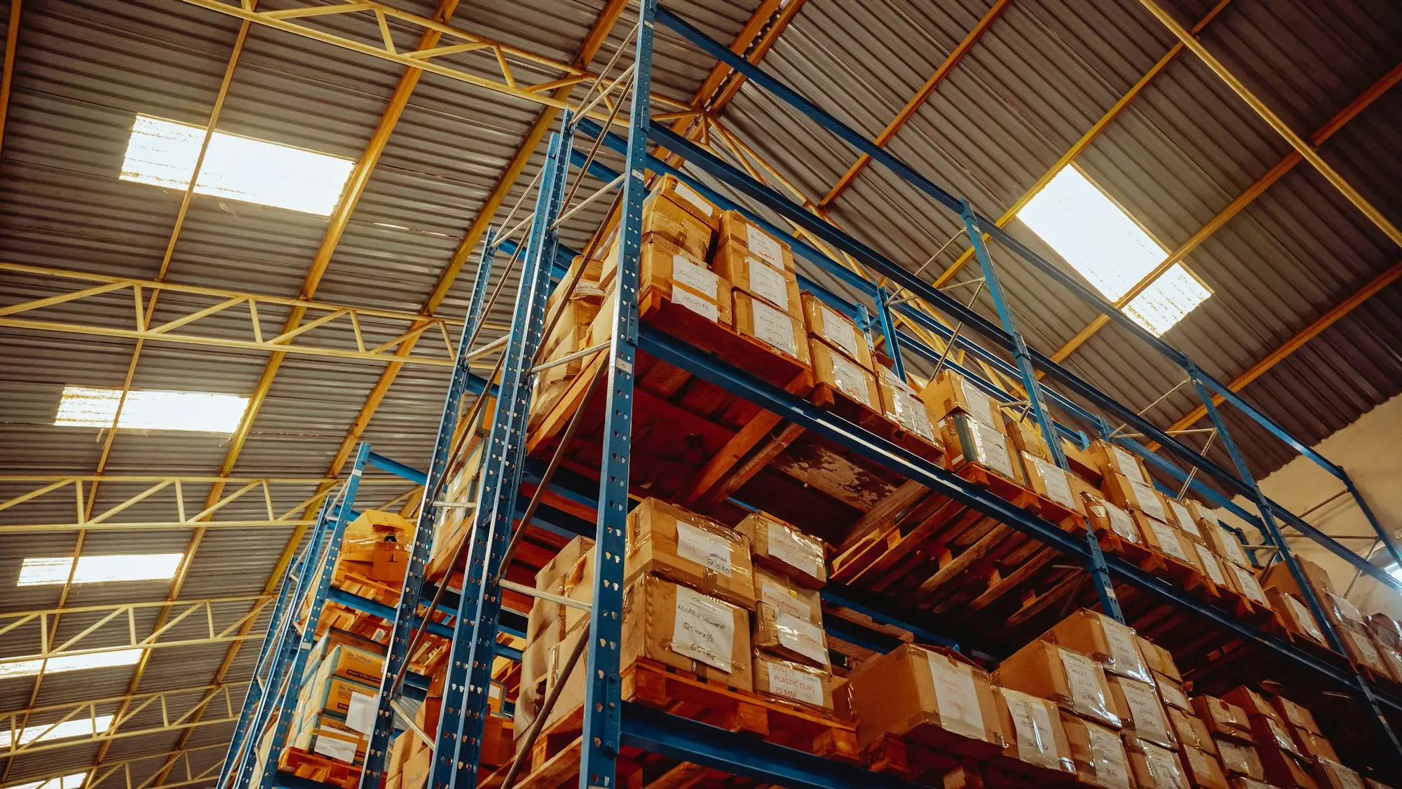 Stockroom racking stacked with cartons of inventory